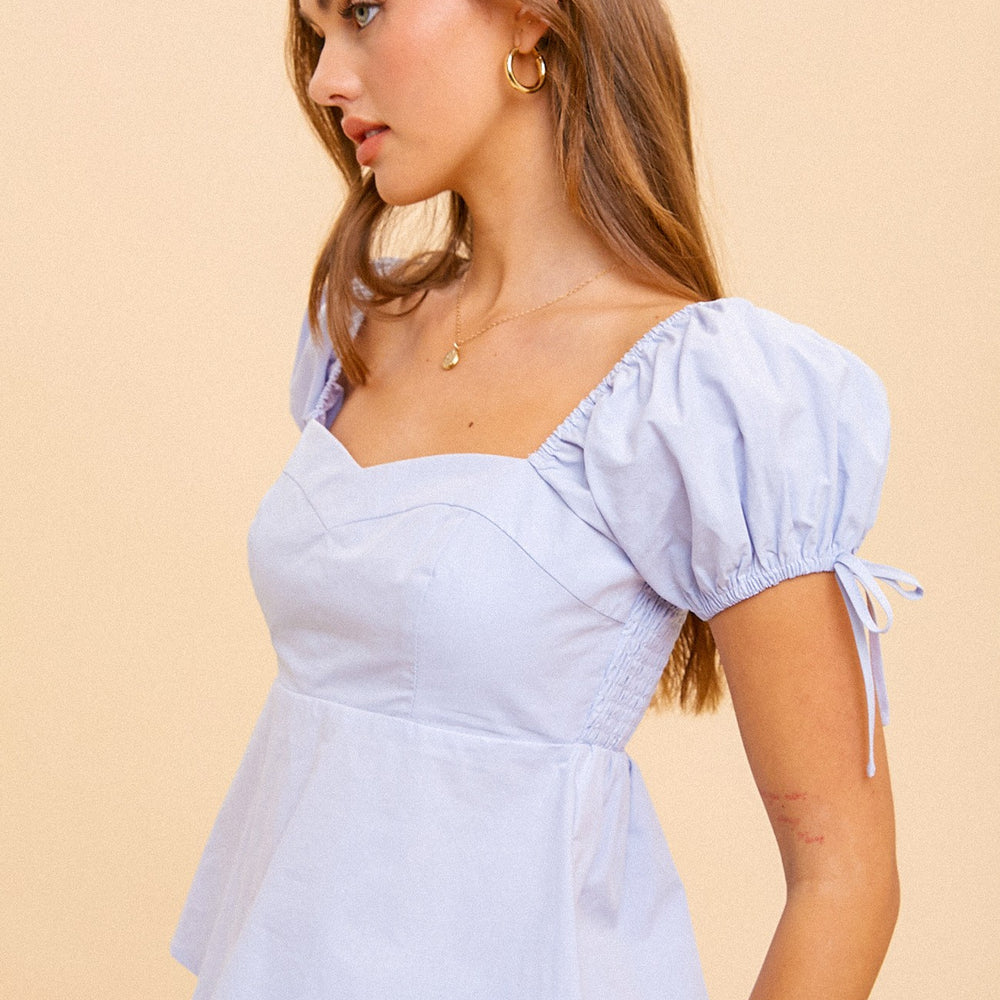 
                      
                        Poplin babydoll top
                      
                    