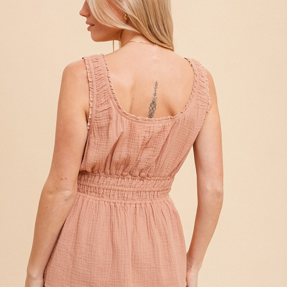 
                      
                        Shirring cotton gauze peplum top
                      
                    