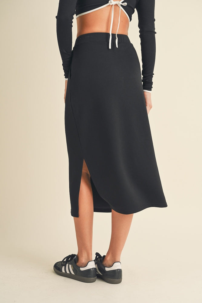 
                      
                        Essential Midi Skirt
                      
                    