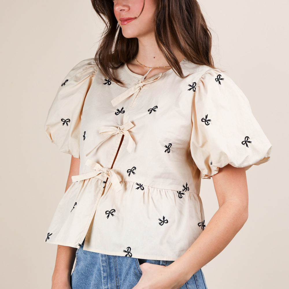
                      
                        Front Tie Bow Embroidered Blouse Top
                      
                    