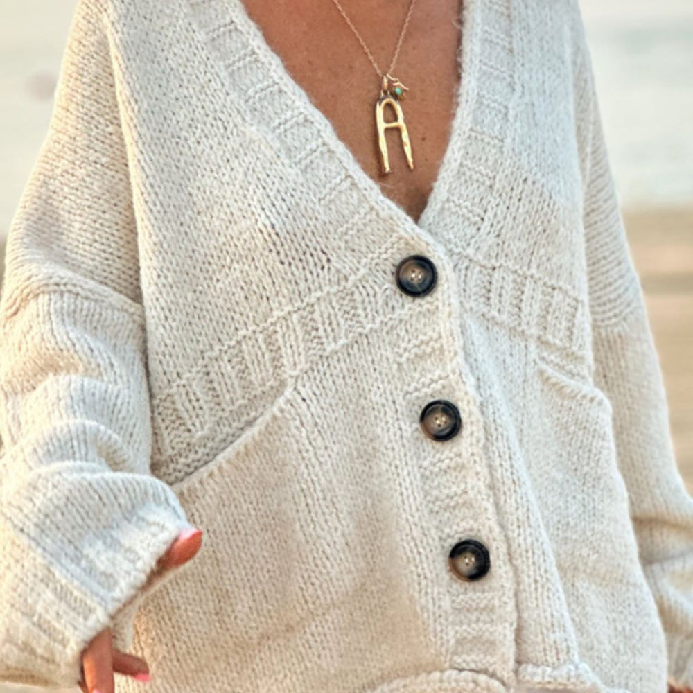 
                      
                        Pocketed V Neck Button Up Cardigan
                      
                    