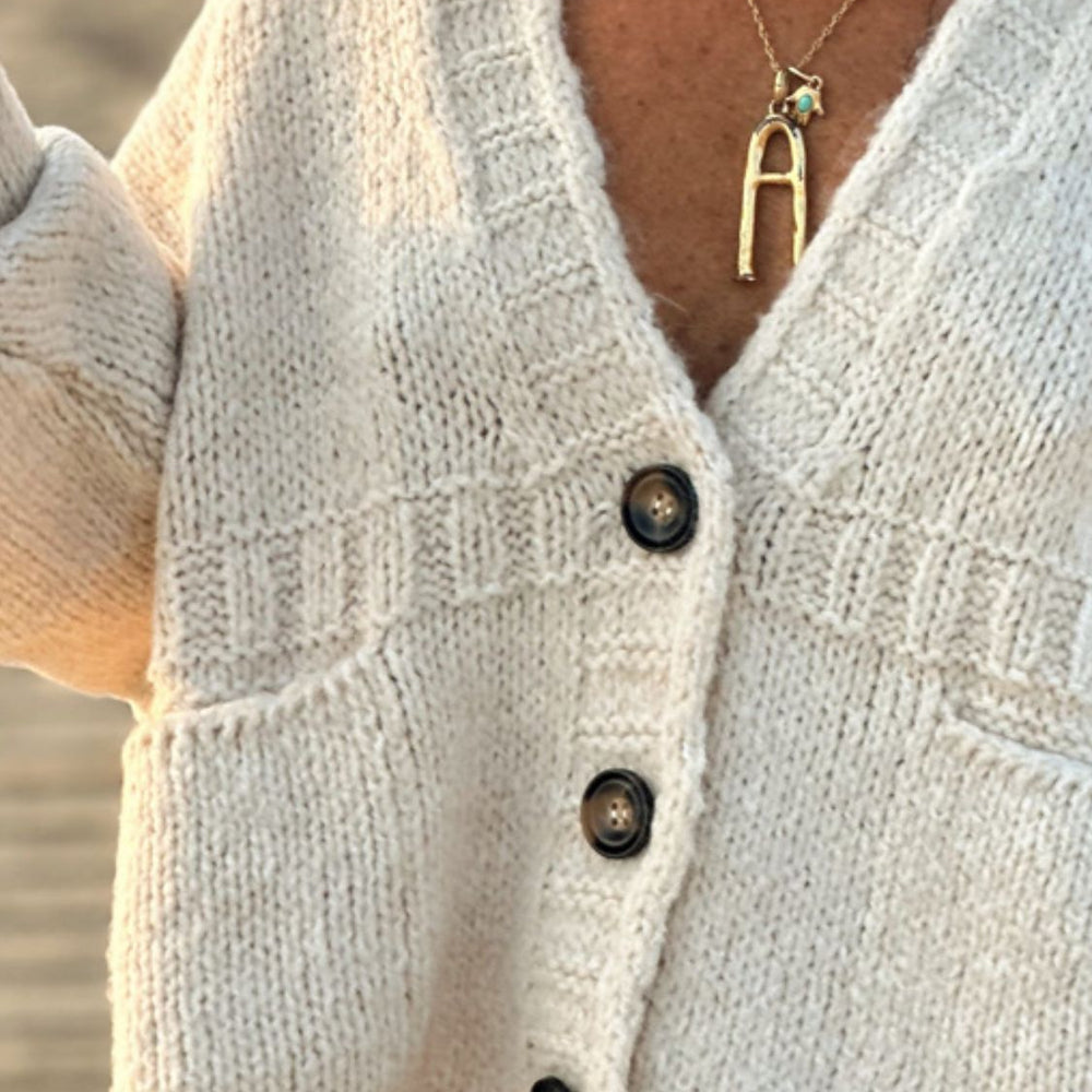 
                      
                        Pocketed V Neck Button Up Cardigan
                      
                    