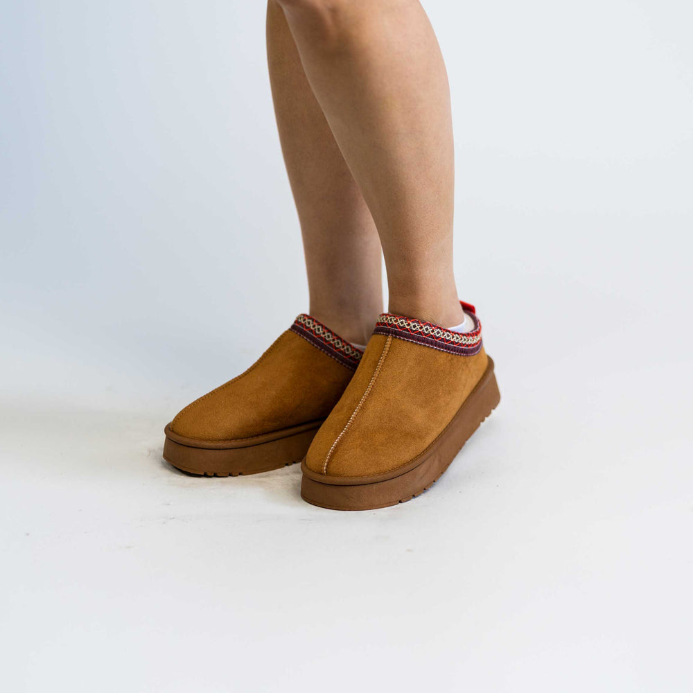 
                      
                        Faux Fur Center-Seam Slippers
                      
                    