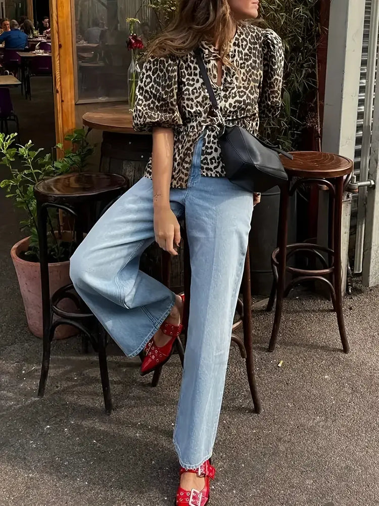 
                      
                        Chic Leopard Print Blouse with Tie-Front Detail
                      
                    